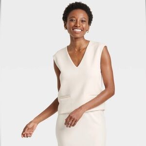 A New Day Cream V-Neck Blouse.